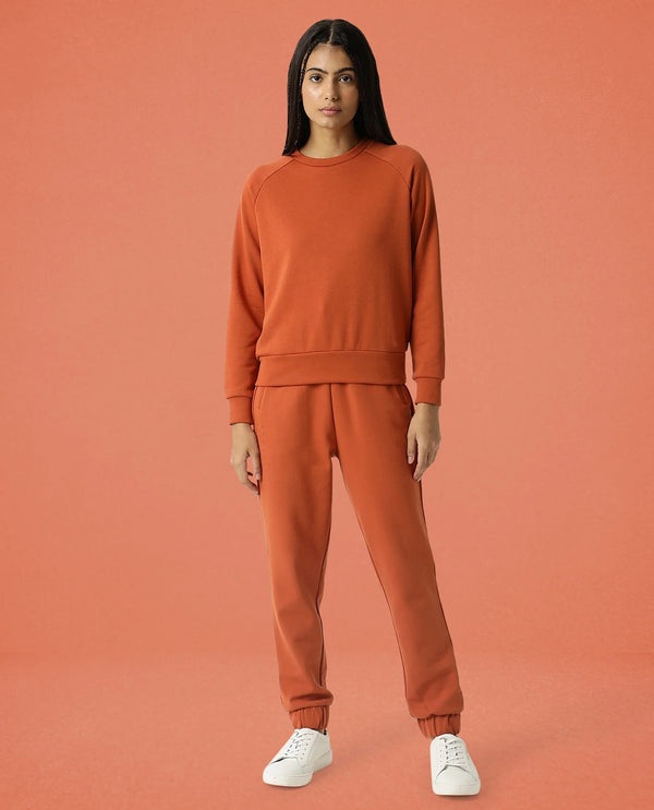 Rareism Women Cax Orange Cotton Blend Fabric Relaxed Fit Full Sleeves Solid Round Neck Sweatshirt