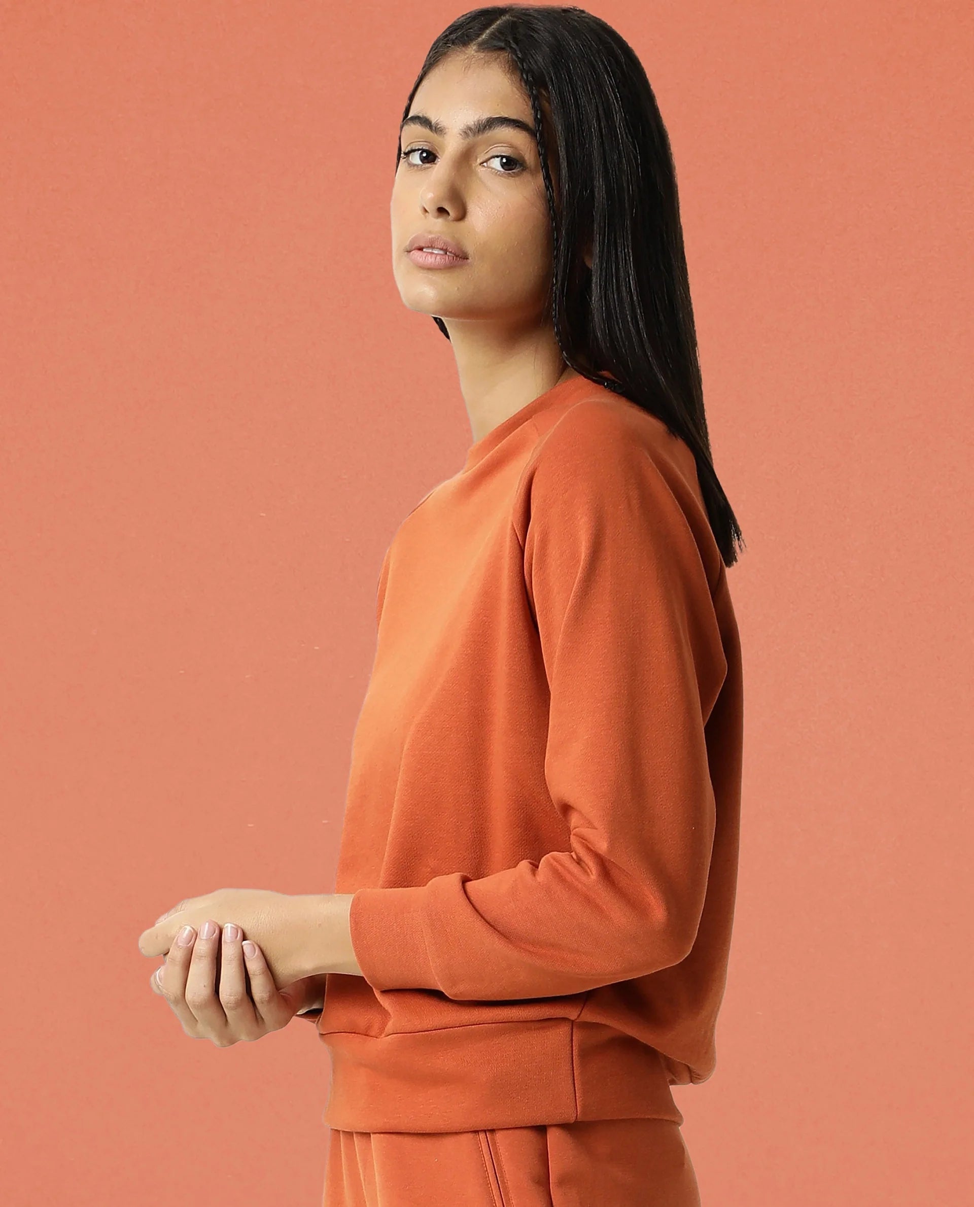 Rareism Women Cax Orange Cotton Blend Fabric Relaxed Fit Full Sleeves Solid Round Neck Sweatshirt