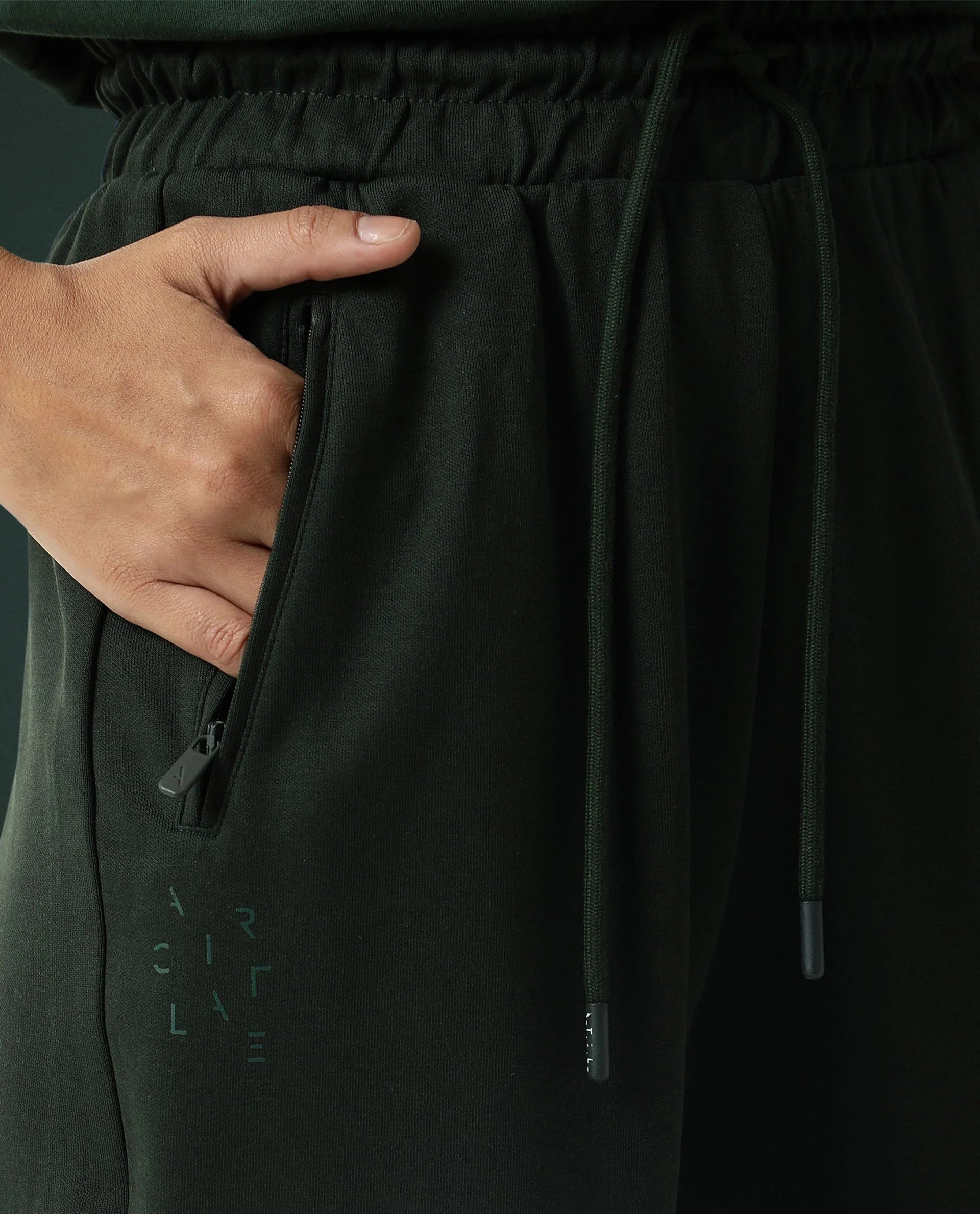 Rareism Women Creta Dark Green Cotton Blend Fabric Relaxed Fit Solid Mid Rise Ankle Length Track Pant