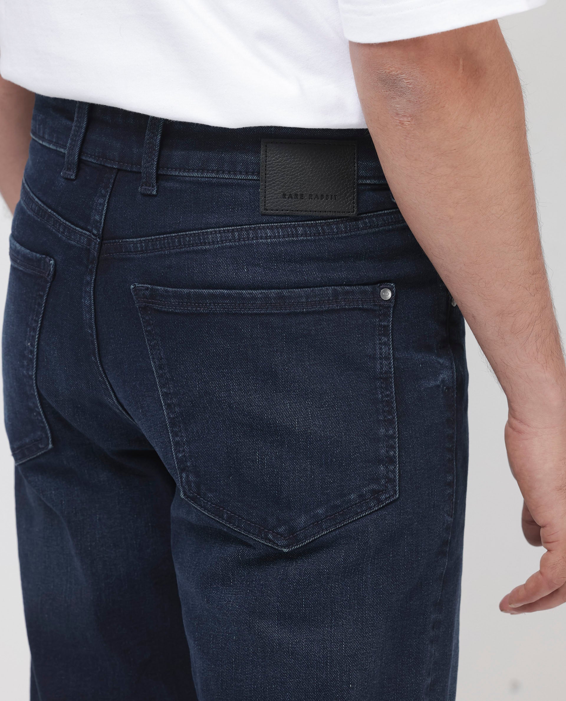 Rare Rabbit Mens Evolve Dark Navy Solid Regular Fit Mid-Rise Dark Wash Jeans
