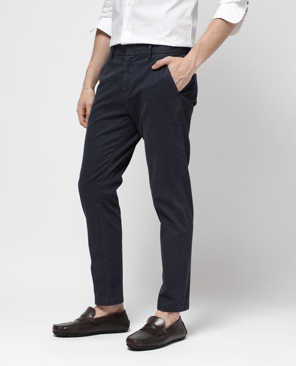 Rare Rabbit Mens Orany Navy Cotton Lycra Solid Mid Rise Overdyed Regular Fit Trouser