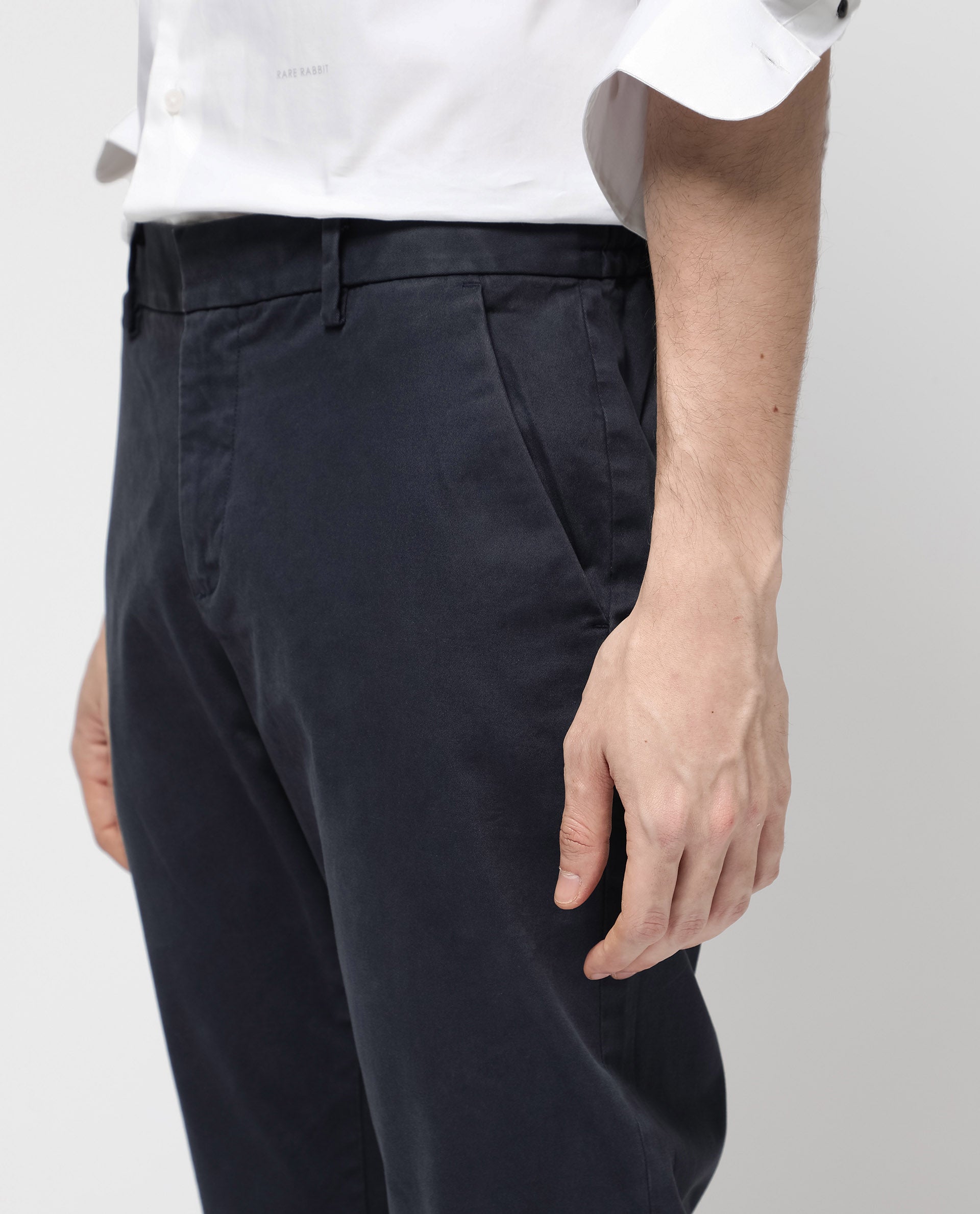 Rare Rabbit Mens Orany Navy Cotton Lycra Solid Mid Rise Overdyed Regular Fit Trouser