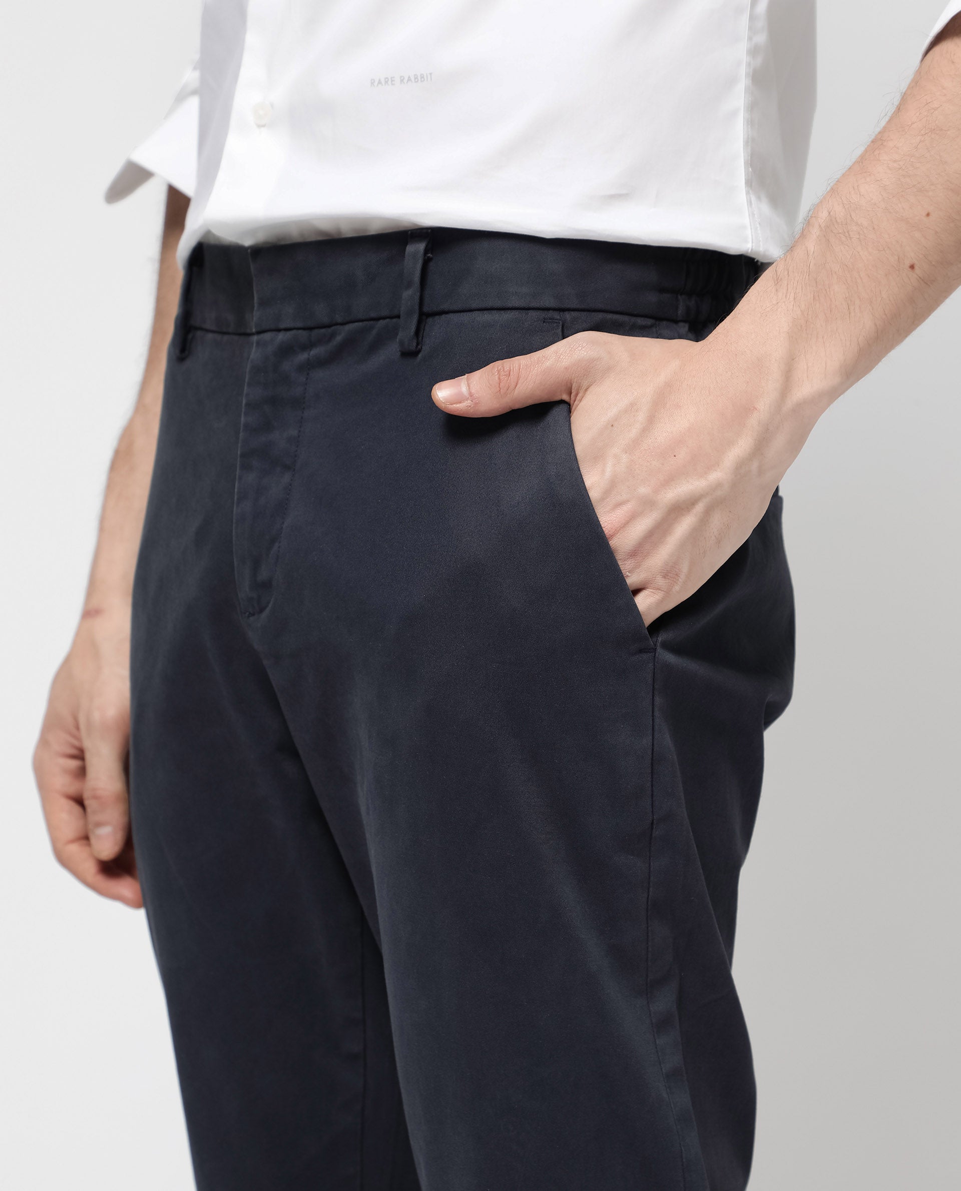 Rare Rabbit Mens Orany Navy Cotton Lycra Solid Mid Rise Overdyed Regular Fit Trouser