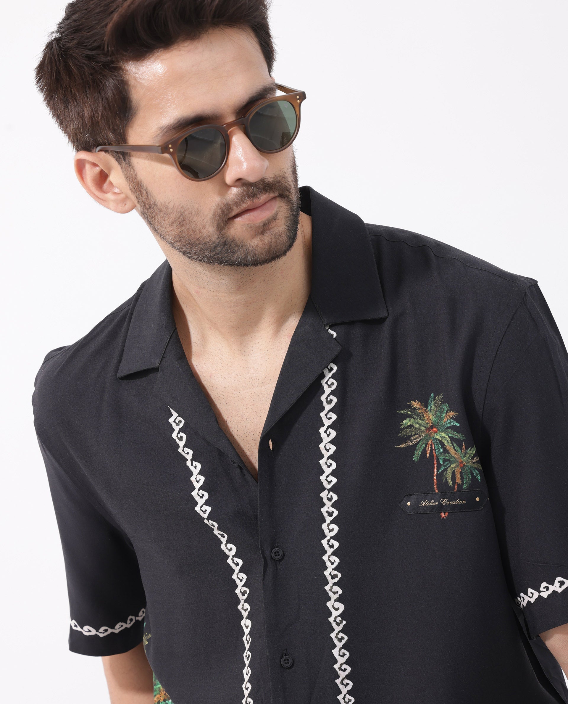 Rare Rabbit Men's Palms Black Viscose Fabric Cuban Collar Half Sleeves Boxy Fit Placement Tropical Print Bowler Shirt