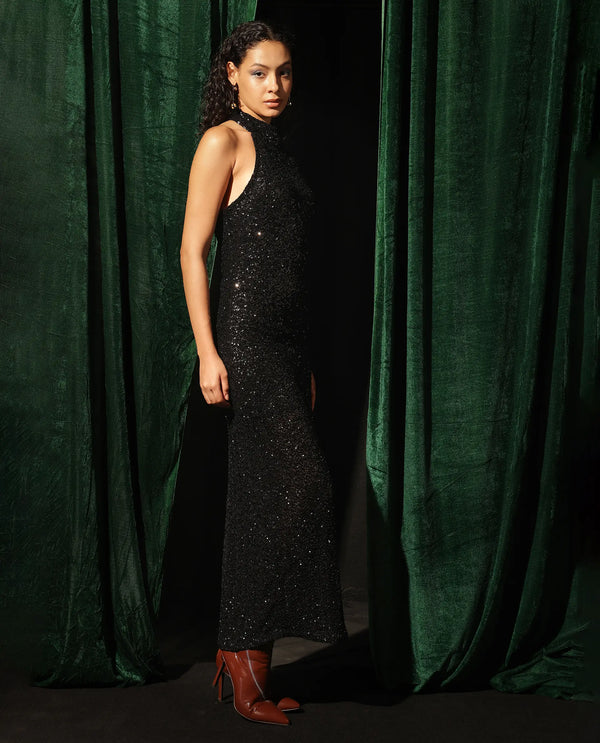 Rareism Women Ardhan Metallic Black Polyester Fabric Sleeveless Halter Neck Button Closure Fitted Maxi Plain Dress