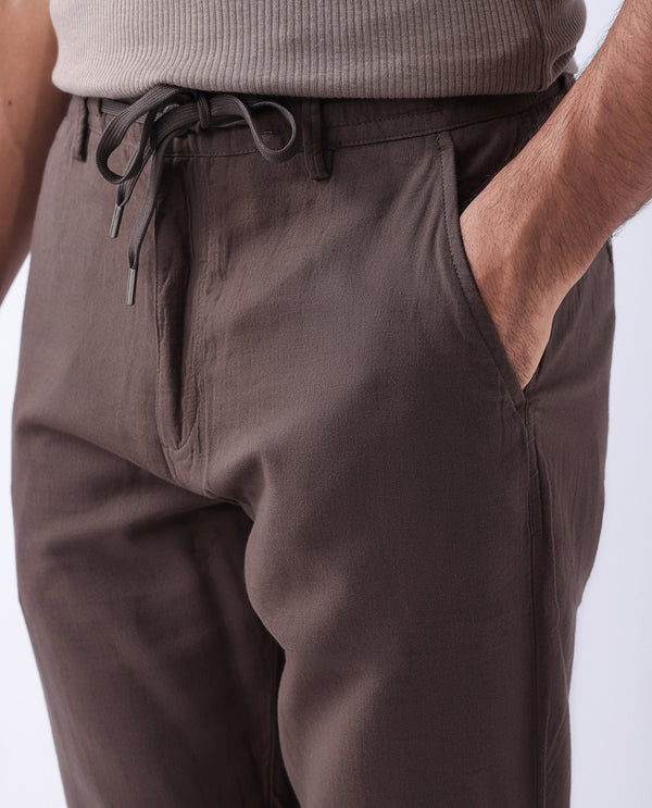 Rare Rabbit Men's Pastor-3 Dark brown Solid Mid-Rise With Drawstring And Elastic Waistband Regular Fit Trousers