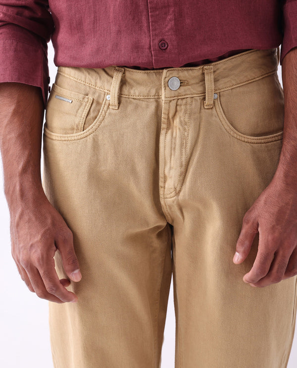 Rare Rabbit Men Arvi Mustard Cotton Fabric Button and Zip Closure Mid Rise Garment Dyed Plain Jeans