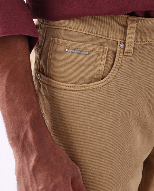 Rare Rabbit Men Arvi Mustard Cotton Fabric Button and Zip Closure Mid Rise Garment Dyed Plain Jeans