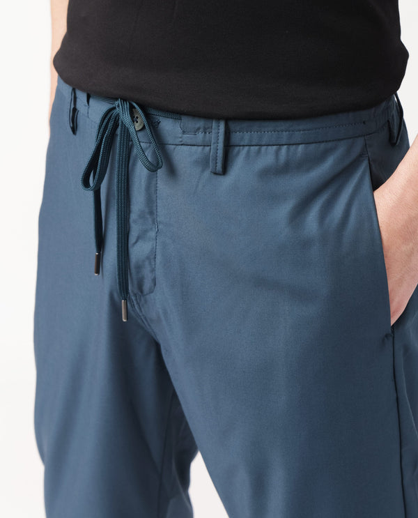 Rare Rabbit Men's Aux Petrol Solid Mid-Rise With Drawstring And Elastic Waistband Regular Fit Trouser