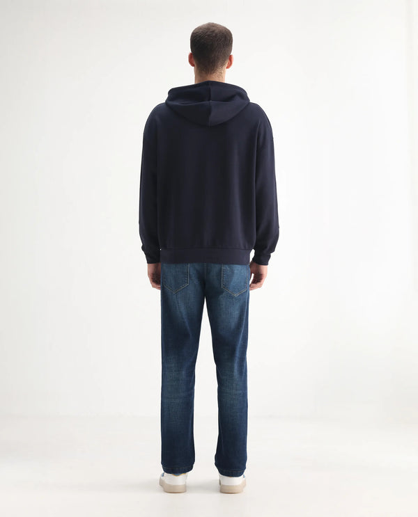 Rare Rabbit Men Axel Blue Cotton Blend Fabric Mid Rise Button and Zip Closure Mid Wash Plain Jeans