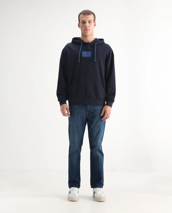 Rare Rabbit Men Axel Blue Cotton Blend Fabric Mid Rise Button and Zip Closure Mid Wash Plain Jeans