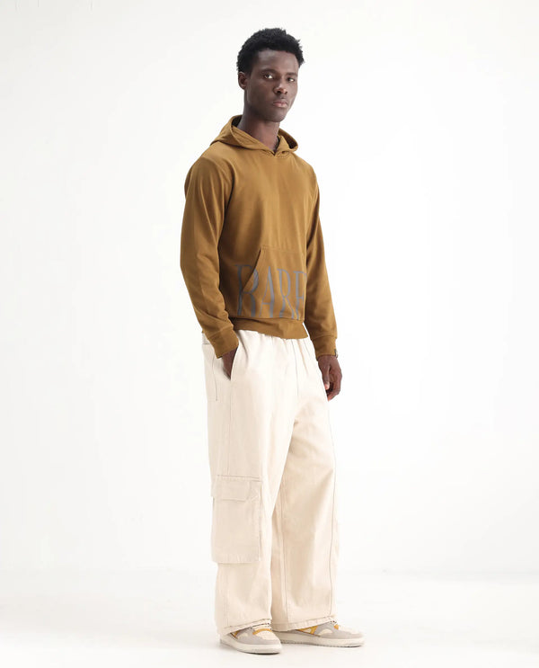 Rare Rabbit Men's Azort Beige Cotton Fabric Button And Zip Closure Baggy Fit Plain Jeans