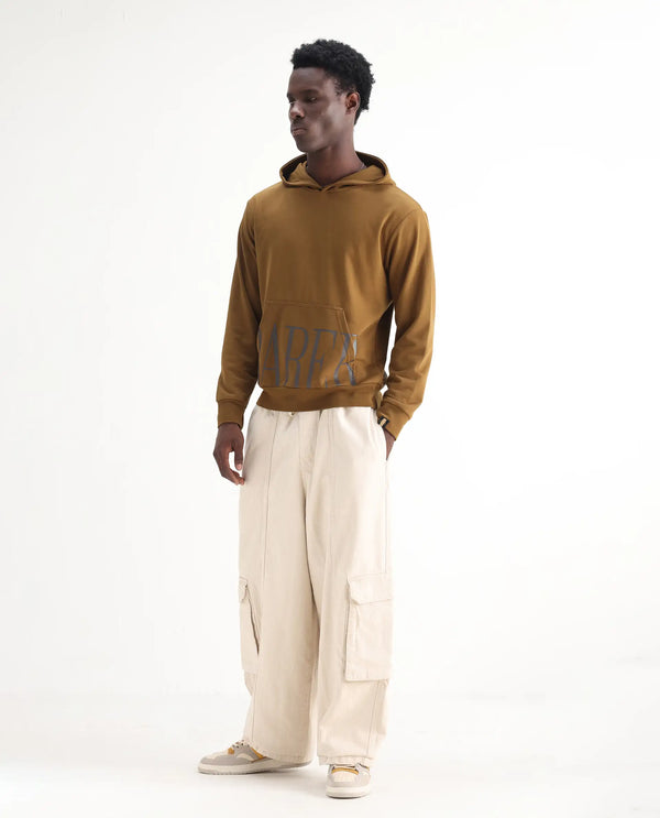 Rare Rabbit Men's Azort Beige Cotton Fabric Button And Zip Closure Baggy Fit Plain Jeans