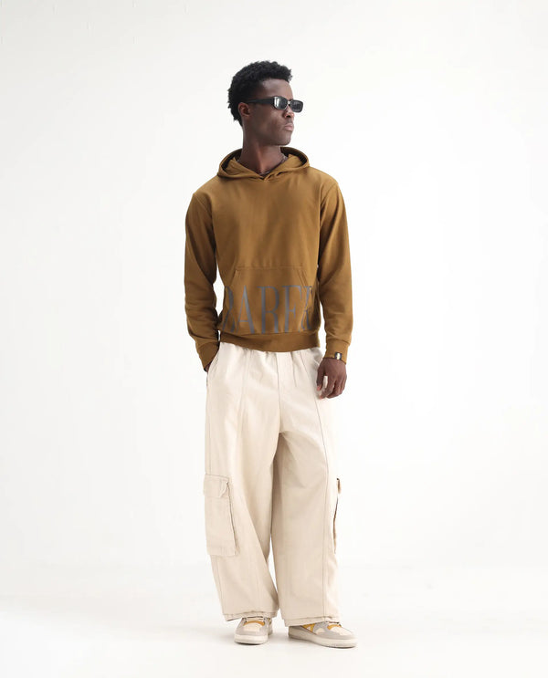 Rare Rabbit Men's Azort Beige Cotton Fabric Button And Zip Closure Baggy Fit Plain Jeans