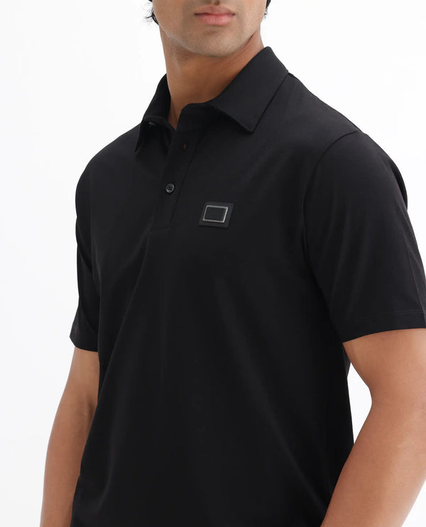 Rare Rabbit Men Badger-25 Black Cotton Poly Fabric Short Sleeve Collared Neck Button Closure Plain Polo