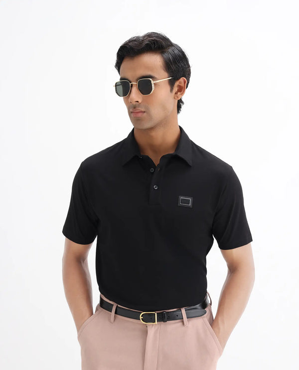 Rare Rabbit Men Badger-25 Black Cotton Poly Fabric Short Sleeve Collared Neck Button Closure Plain Polo