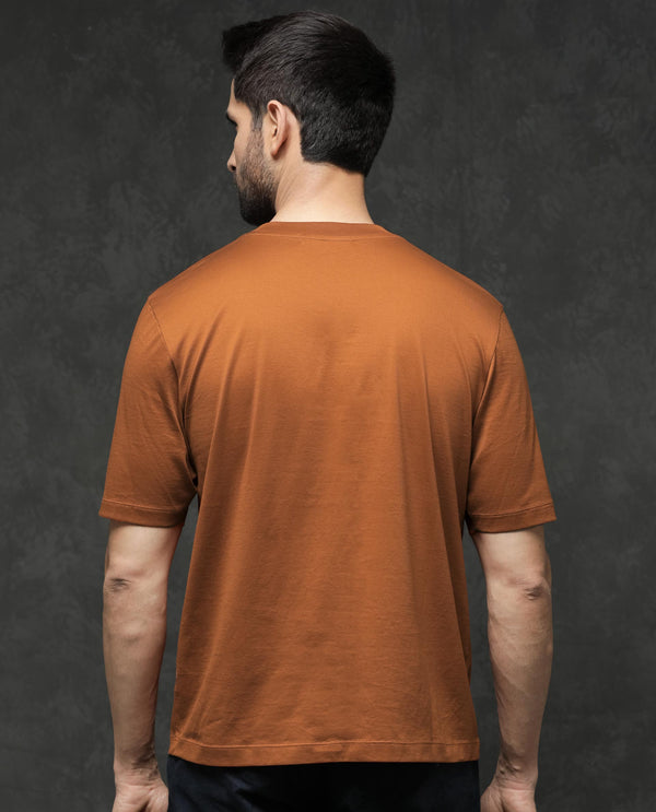 Rare Rabbit Mens Barcelon Rust Cotton Fabric Short Sleeves Oversized Fit Solid T-Shirt