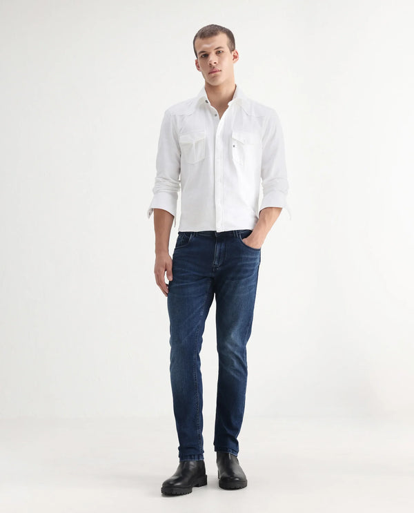 Rare Rabbit Mens Benn Blue Cotton Polyester Mid Wash Solid Slim Fit Jeans