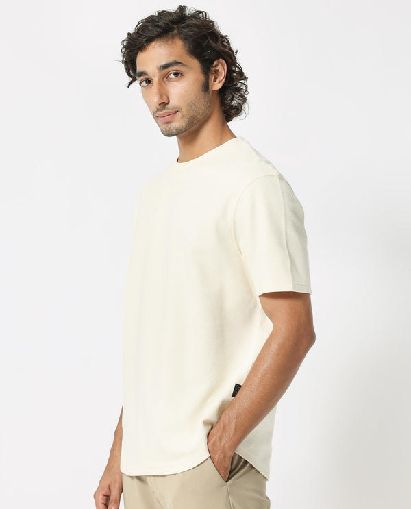 Rare Rabbit Men's Buenos Beige Solid Crew Neck Drop Shoulder Half Sleeves T-Shirt