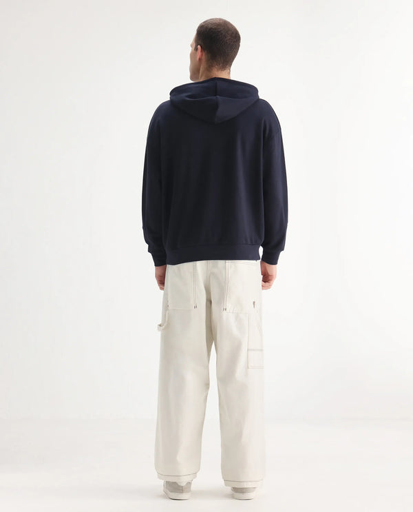Rare Rabbit Men Cade White Cotton Fabric Button And Zip Closure Baggy Loose Fit Plain Jeans