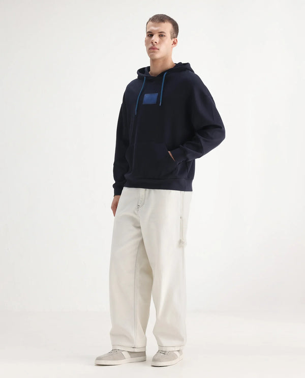Rare Rabbit Men Cade White Cotton Fabric Button And Zip Closure Baggy Loose Fit Plain Jeans