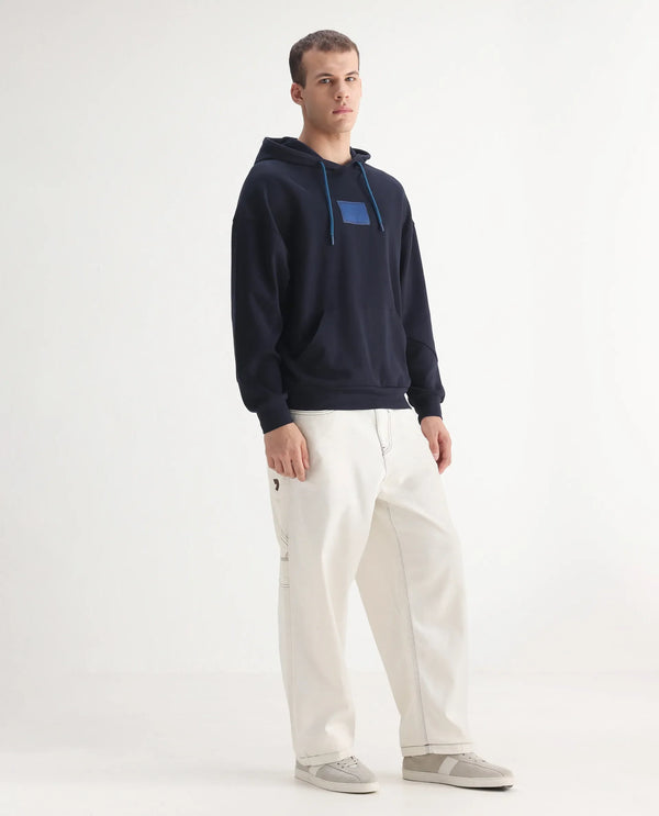 Rare Rabbit Men Cade White Cotton Fabric Button And Zip Closure Baggy Loose Fit Plain Jeans