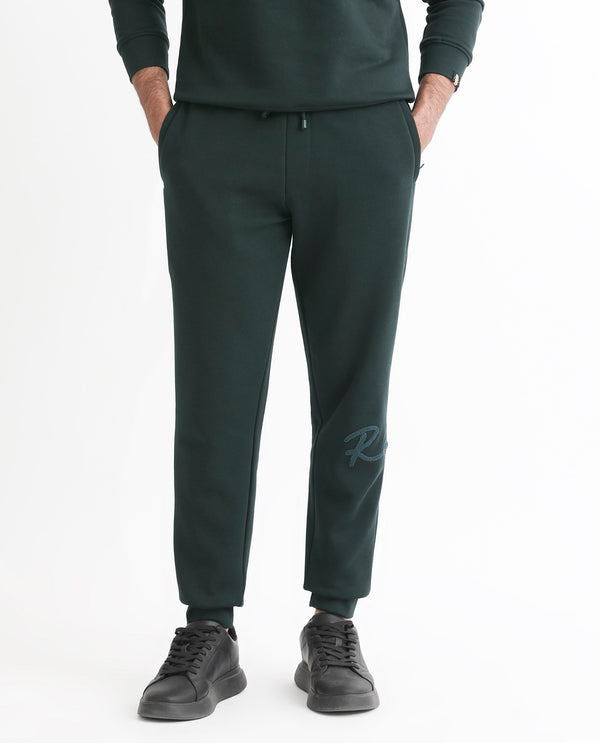 Rare Rabbit Mens Callan Dark Green Cotton Polyester Fabric Drawstring Closure Regular Fit Mid Rise Embroidered Branding Trackpant