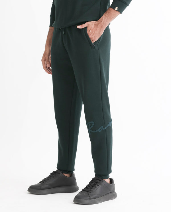 Rare Rabbit Mens Callan Dark Green Cotton Polyester Fabric Drawstring Closure Regular Fit Mid Rise Embroidered Branding Trackpant