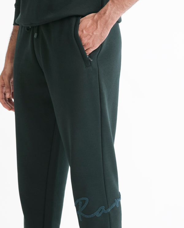 Rare Rabbit Mens Callan Dark Green Cotton Polyester Fabric Drawstring Closure Regular Fit Mid Rise Embroidered Branding Trackpant