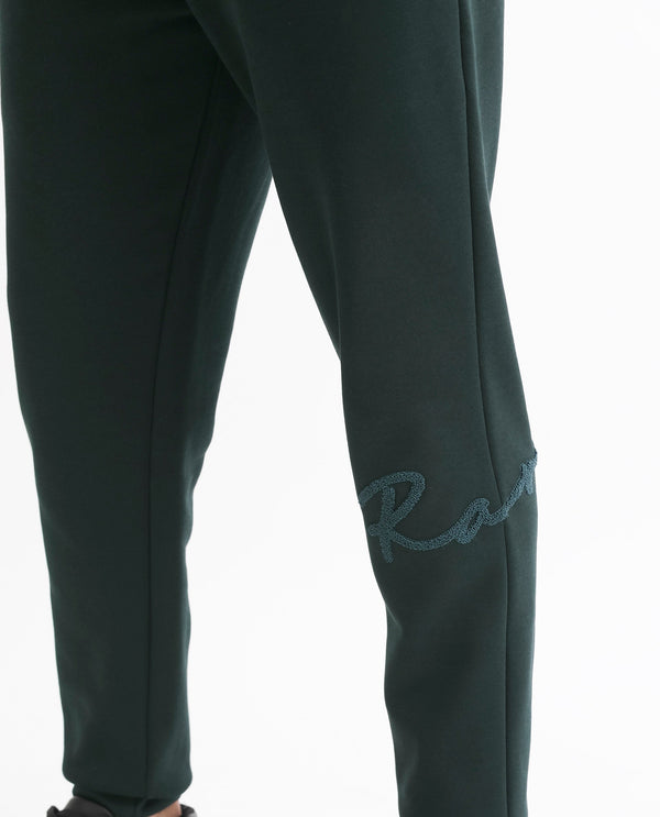 Rare Rabbit Mens Callan Dark Green Cotton Polyester Fabric Drawstring Closure Regular Fit Mid Rise Embroidered Branding Trackpant