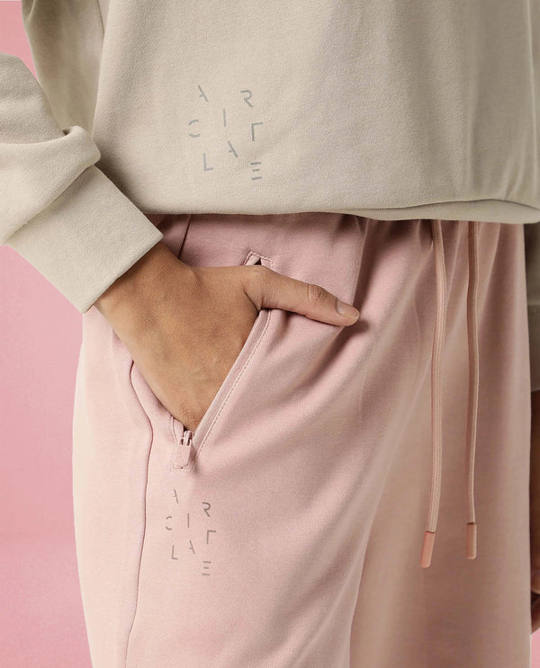 Rareism Women Capsule Dusky Pink Cotton Blend Fabric Relaxed Fit Solid Mid Rise Ankle Length Track Pant
