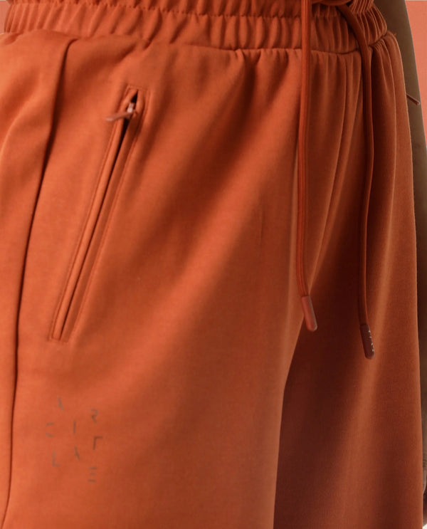 Rareism Women Capsule Orange Cotton Blend Fabric Relaxed Fit Solid Mid Rise Ankle Length Track Pant