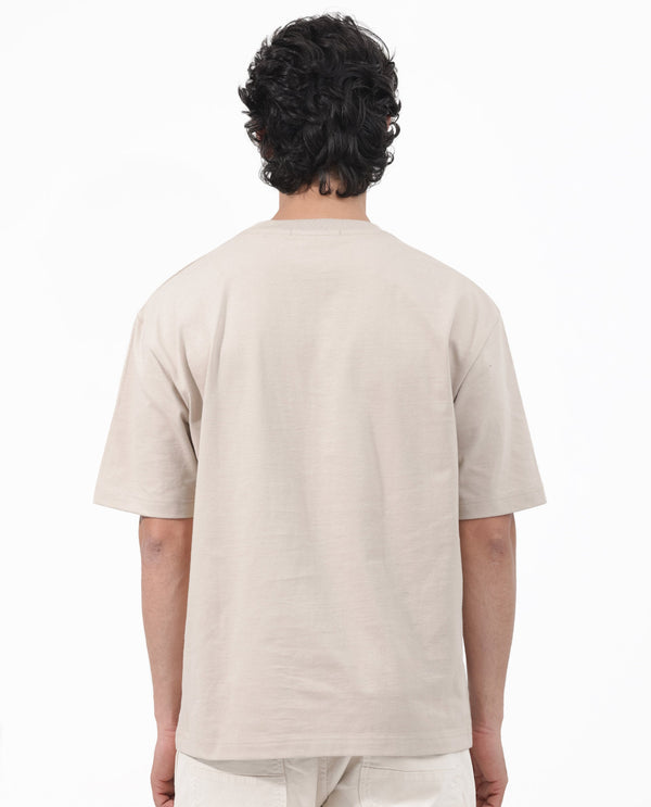 Rare Rabbit Articale Mens Carter Dusky Beige Cotton Fabric Short Sleeve Crew Neck Boxy Fit Printed T-Shirt
