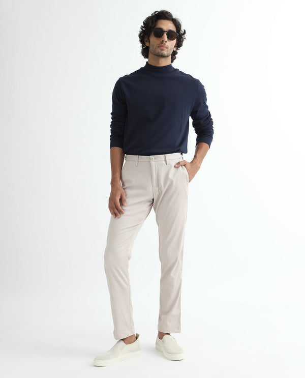 Rare Rabbit Men's Cellular Light Pink Solid Mid-Rise Regular Fit Twill Trouser