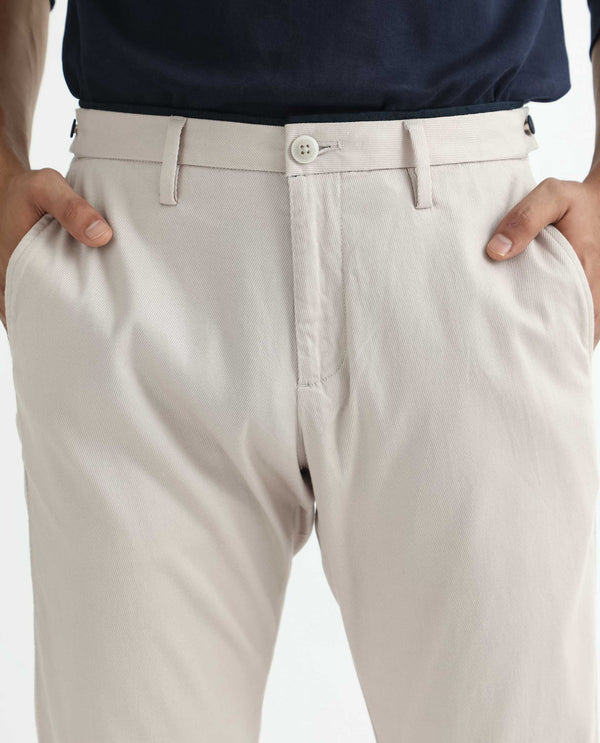 Rare Rabbit Men's Cellular Light Pink Solid Mid-Rise Regular Fit Twill Trouser