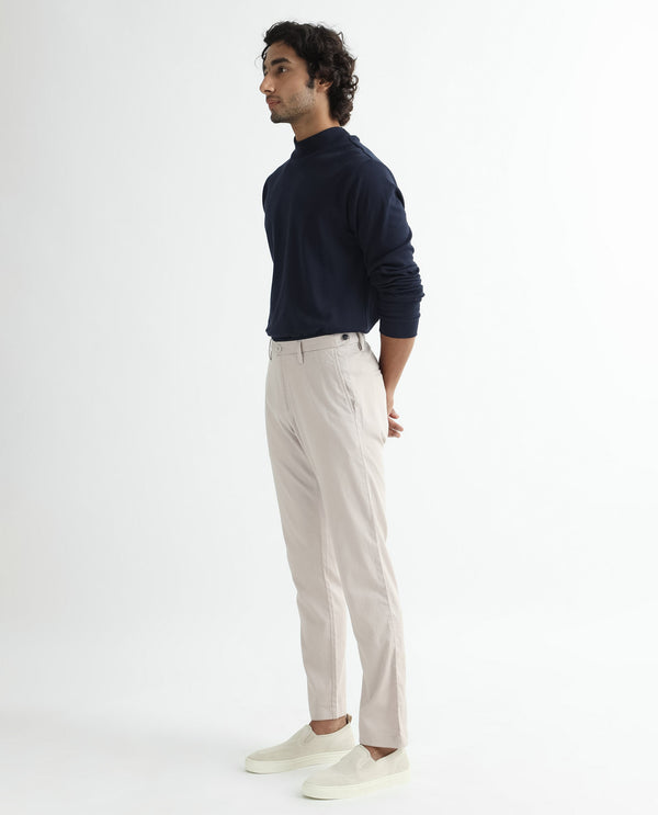 Rare Rabbit Men's Cellular Light Pink Solid Mid-Rise Regular Fit Twill Trouser