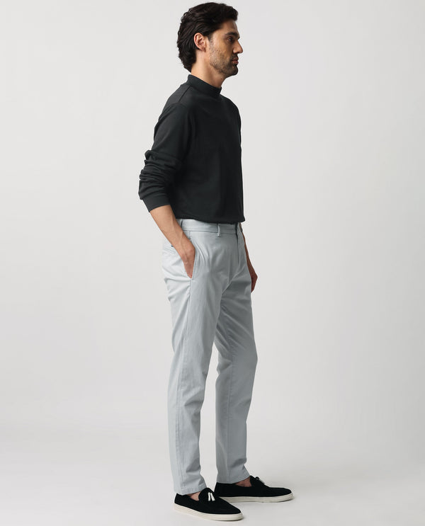 Rare Rabbit Men's Clovet Light Blue Solid Stretch Mid-Rise Regular Fit Trouser