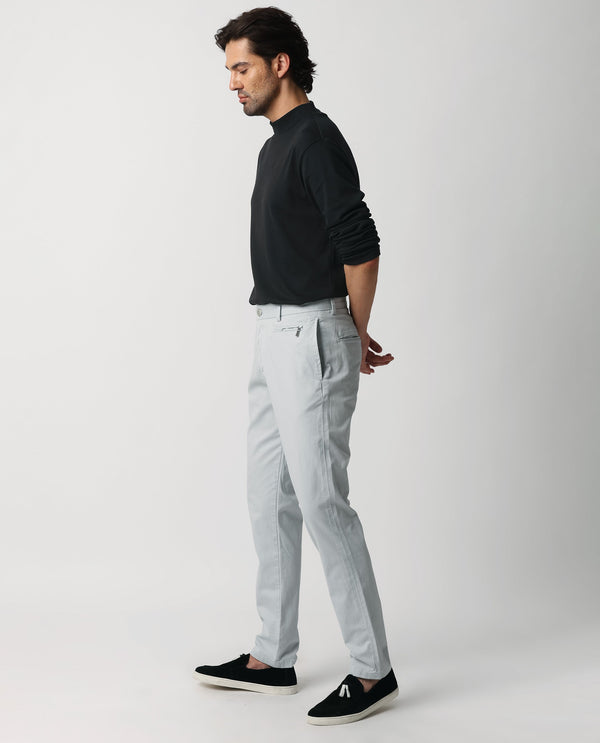 Rare Rabbit Men's Clovet Light Blue Solid Stretch Mid-Rise Regular Fit Trouser