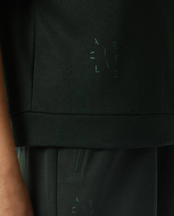 Rareism Women Coco Dark Green Cotton Fabric Half Sleeves Relaxed Fit Solid Round Neck Sweat Tee