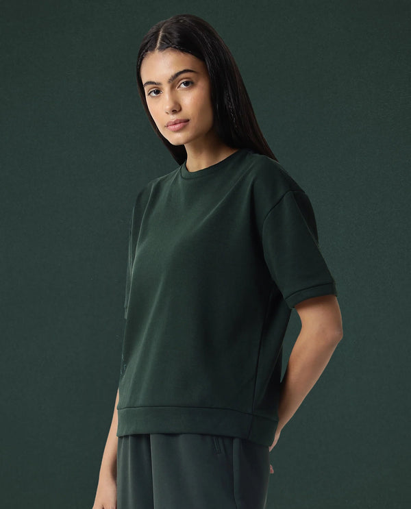 Rareism Women Coco Dark Green Cotton Fabric Half Sleeves Relaxed Fit Solid Round Neck Sweat Tee