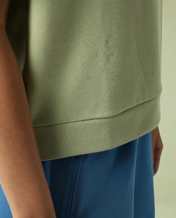 Rareism Women Coco Light Green Cotton Fabric Half Sleeves Relaxed Fit Solid Round Neck Sweat Tee