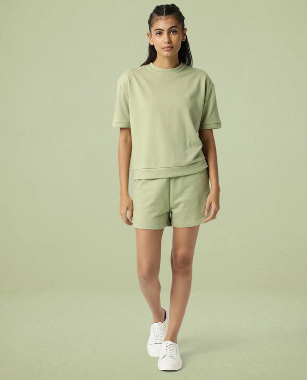 Rareism Women Coco Light Green Cotton Fabric Half Sleeves Relaxed Fit Solid Round Neck Sweat Tee