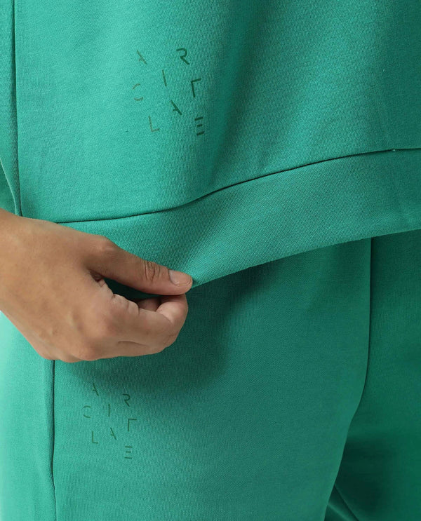 Rareism Women Coco Green Cotton Fabric Half Sleeves Relaxed Fit Solid Round Neck Sweat Tee