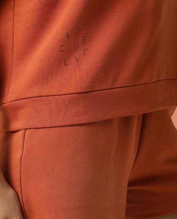 Rareism Women Coco Orange Cotton Fabric Half Sleeves Relaxed Fit Solid Round Neck Sweat Tee