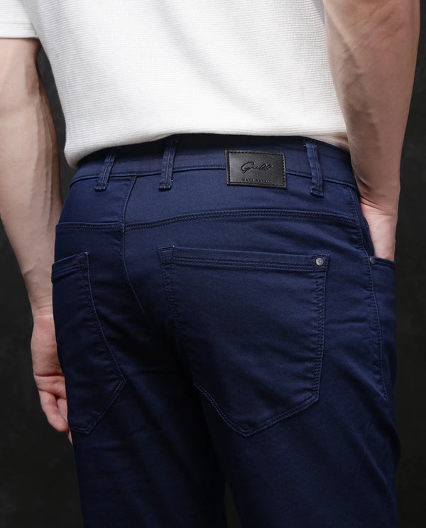 Rare Rabbit Men Corvo Blue Cotton Polyester Fabric Slim Fit Plain Denim Pant
