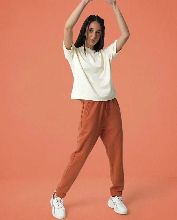 Rareism Women Creta Orange Cotton Blend Fabric Relaxed Fit Solid Mid Rise Ankle Length Track Pant