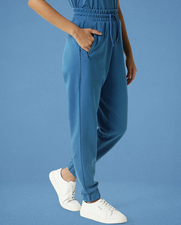 Rareism Women Creta Petrol Cotton Blend Fabric Relaxed Fit Solid Mid Rise Ankle Length Track Pant