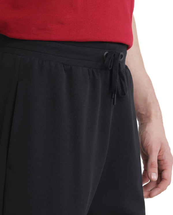 Rare Rabbit Men Dalton Black Cotton Elastane Fabric Baggy Fit Drawstring Closure Plain Knitted Trouser