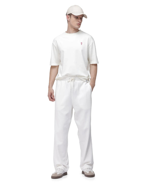 Rare Rabbit Men Dalton Off White Cotton Elastane Fabric Baggy Fit Plain Knitted Trouser