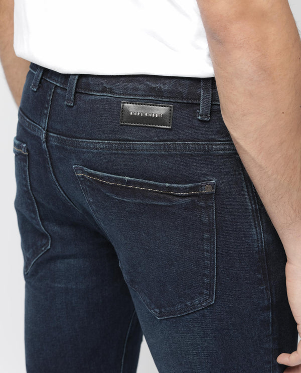 Rare Rabbit Men's Erie Dusky Blue Slim Fit Mid Rise Mid Wash With Mild Whisker Distress Jeans